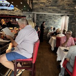 Oak & Ember Steakhouse - Bar tables and high tops for happy hour