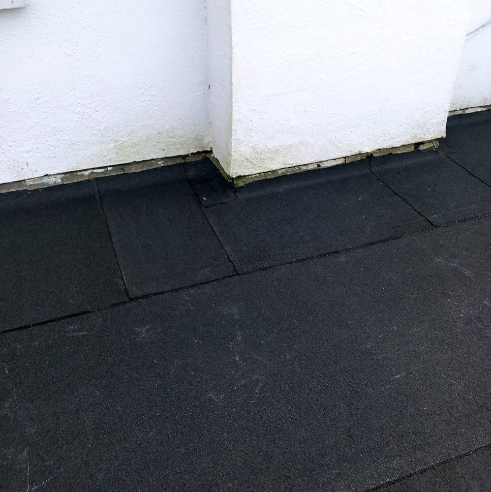 Slide of Pecan Park Roofing