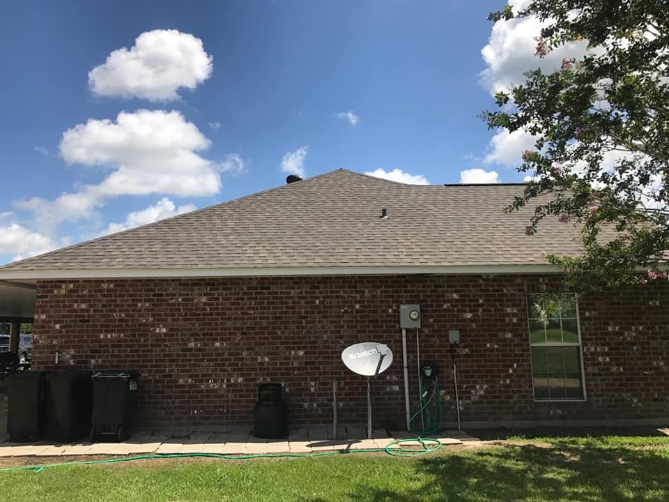 Slide of John Theriots Roofing