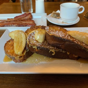 Farm Bell Kitchen - Bananas Foster French Toast and side of artisan thick-cut bacon - Southern Near Me - Charlottesville, Virginia Farm Bell Kitchen - Bananas Foster French Toast and side of artisan thick-cut bacon - Southern Near Me - Charlottesville, Virginia