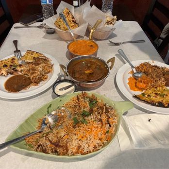Tandoori Affaire - Mutton Biryani, Mutton Curry (Goat), Butter Chicken,Aachari Naan, Garlic Naan, and Samosa 2 Pieces that is not picture. - Indian Near Me - Naperville, Illinois