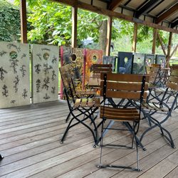 Chautauqua General Store - Nice new seating with game art display on the pavilion