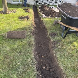 D&E Landscaping - Downspouts burying