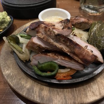 Uncle Julio's - Chicken fajitas. Plate has shrunk since last year - Mexican Near Me - Skokie, Illinois
