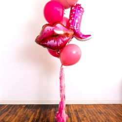 Pink Flamingo Party Co - A fun and stylish helium bouquet available on our website featuring our handmade tassels!