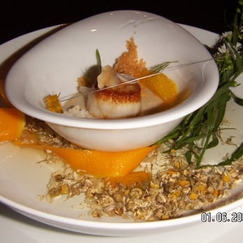 Alinea - Scallop, parsnip, orange, chamomile vapor. hot water's poured into the surrounding bowl of chamomile = vapor! - New American Near Me - Chicago, Illinois Alinea - Scallop, parsnip, orange, chamomile vapor. hot water's poured into the surrounding bowl of chamomile = vapor! - New American Near Me - Chicago, Illinois