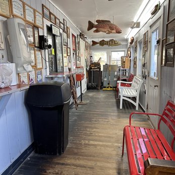 Hingham Lobster Pound - a long hallway with red benches - Seafood Markets Near Me - Hingham, Massachusetts