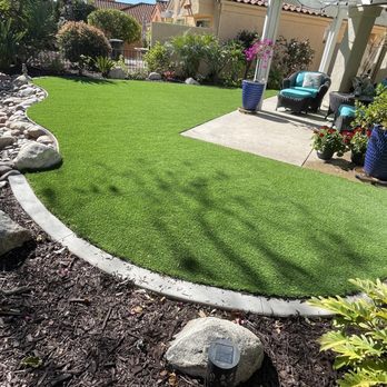 Helcco Landscape Construction - Artificial turf with mow guard - Landscaping Near Me