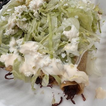 Tacos Don Paco - Creamy cheese and lettuce with guacamole on top of the rolled tacos - Mexican Near Me - Oceanside, California Tacos Don Paco - Creamy cheese and lettuce with guacamole on top of the rolled tacos - Mexican Near Me - Oceanside, California