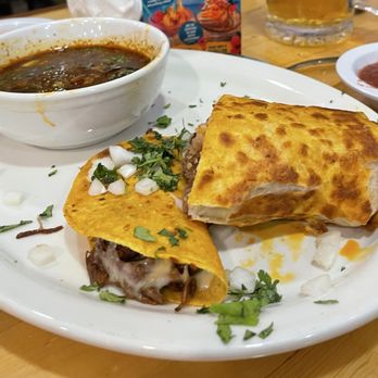 Mi Mexico Lindo Mexican Grill - Half a birria burrito and half a quesabirrio taco - Seafood Near Me - O'Fallon, Missouri Mi Mexico Lindo Mexican Grill - Half a birria burrito and half a quesabirrio taco - Seafood Near Me - O'Fallon, Missouri