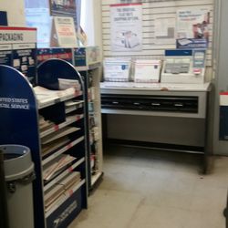US Post Office - Work station to fill out your paperwork & addresses.