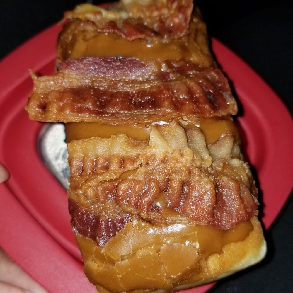 About half of my maple bacon donut. About half of my maple bacon donut.