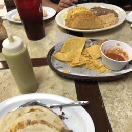 Crispy taco plate and bean and cheese taco , carne asada taco Crispy taco plate and bean and cheese taco , carne asada taco