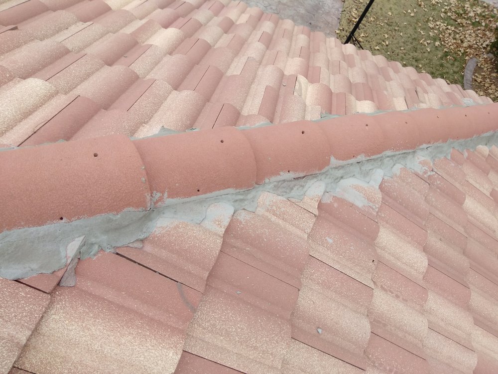 Slide of Baez Roof Service