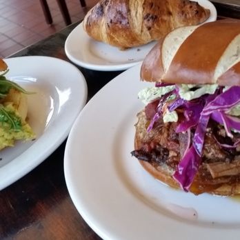 Farmer In The Dell - left: sorry forgot exactly what, some breakfast-sounding sandwich LOL right: pulled pork with pickled slaw on pretzel bun. - Breakfast & Brunch Near Me - Walpole, Massachusetts Farmer In The Dell - left: sorry forgot exactly what, some breakfast-sounding sandwich LOL right: pulled pork with pickled slaw on pretzel bun. - Breakfast & Brunch Near Me - Walpole, Massachusetts