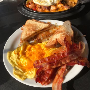 Denny's - Scrambled eggs with aged cheddar cheese, bacon and white toast. Plus a sizzling platter. - American Near Me - Hayward, California