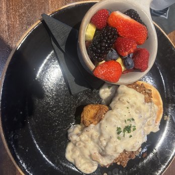 Reunion Kitchen + Drink - Chicken with biscuits and gravy and a fruit bowl - New American Near Me - Corona, California Reunion Kitchen + Drink - Chicken with biscuits and gravy and a fruit bowl - New American Near Me - Corona, California