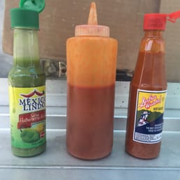 All 3 on my tostada de ceviche please! Middle one is tapatio All 3 on my tostada de ceviche please! Middle one is tapatio