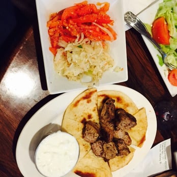 Hellenic - Souvlaki with perfectly seasoned marinated tomatoes & onions and tzatziki sauce - Greek Near Me - East Marion, New York