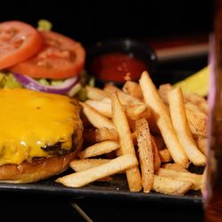 The Seville Club - The Seville Gentlemens club offers upscale authentic downtown Minneapolis American cuisine.  Try our Seville cheeseburger!