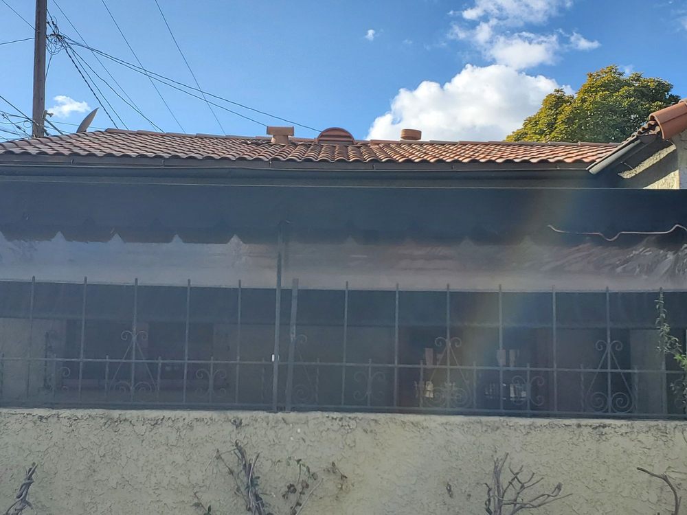 Slide of All American Construction and Roofing