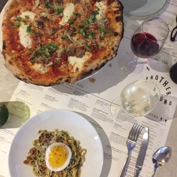 Sixty Vines - Spicy sausage pizza and duck egg fettuccine plus wines for the table - New American Near Me - Plano, Texas Sixty Vines - Spicy sausage pizza and duck egg fettuccine plus wines for the table - New American Near Me - Plano, Texas