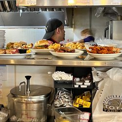 The Cow An Eatery - Chefs cranking out delicious home style food