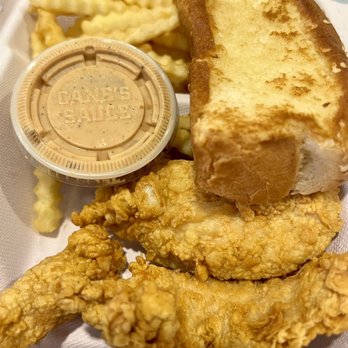Raising Cane's Chicken Fingers - Chicken fingers, toast, fries and Cane's sauce - Comfort Food Near Me - Honolulu, Hawaii Raising Cane's Chicken Fingers - Chicken fingers, toast, fries and Cane's sauce - Comfort Food Near Me - Honolulu, Hawaii