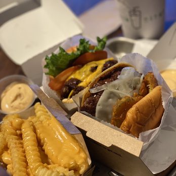 Shake Shack - Slap shot and Shack burger double patty with cheese fires and a strawberry shake - Burgers Near Me - Las Vegas, Nevada Shake Shack - Slap shot and Shack burger double patty with cheese fires and a strawberry shake - Burgers Near Me - Las Vegas, Nevada