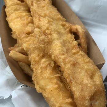 Chef John's Fish & Chips - 2pc Fish n Chip hanging off the tray - Fish & Chips Near Me - Lemon Grove, California Chef John's Fish & Chips - 2pc Fish n Chip hanging off the tray - Fish & Chips Near Me - Lemon Grove, California