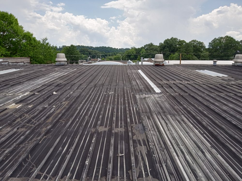 Slide of Taylor Made Roofing