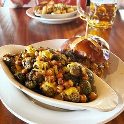Bay Street Biergarten - Crispy Brussels Sprouts with Chick Peas and a Pulled Pork Sandwich