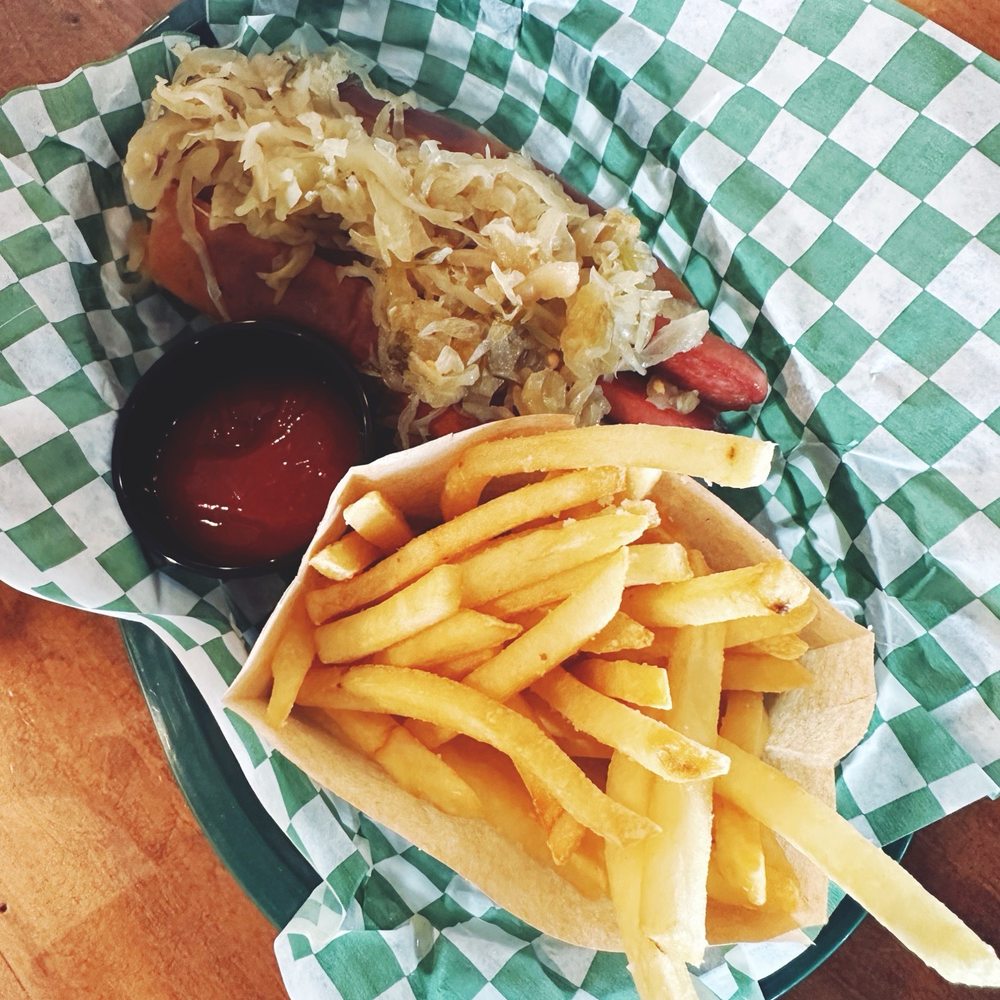 The Acres - All beef kraut hot dog with a side of fries. - Mini Golf Near Me - Cincinnati, Ohio The Acres - All beef kraut hot dog with a side of fries. - Mini Golf Near Me - Cincinnati, Ohio