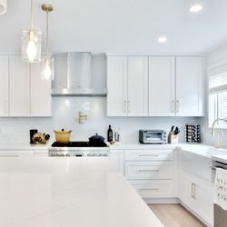Profusion Interiors - White and gold kitchen remodeling and design