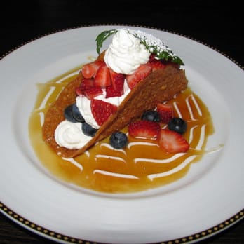 The Blacksmith Restaurant - Lace Cookie Taco with vanilla cream and fresh berries - Lounges Near Me - Bend, Oregon The Blacksmith Restaurant - Lace Cookie Taco with vanilla cream and fresh berries - Lounges Near Me - Bend, Oregon