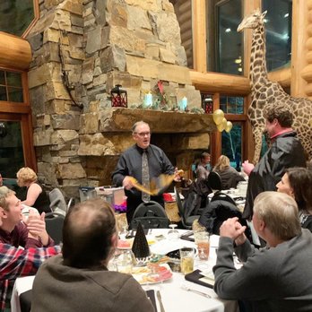 Magic Village Shows - Table magic at an adult gathering. - Magicians Near Me Magic Village Shows - Table magic at an adult gathering. - Magicians Near Me