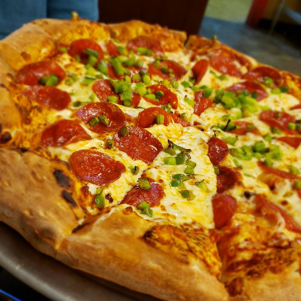 Scotts Grill - Hand tossed pepperoni and bell peppers pizza - Steakhouses Near Me - Union City, Tennessee Scotts Grill - Hand tossed pepperoni and bell peppers pizza - Steakhouses Near Me - Union City, Tennessee