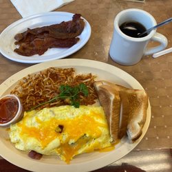 Countryside Cafe - Ham,onion and American cheese omelette with a side of bacon.  Very tasty.