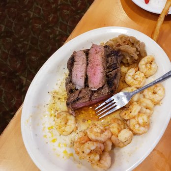 Sara J's - a plate of food on a table - Seafood Near Me - Garden City, South Carolina Sara J's - a plate of food on a table - Seafood Near Me - Garden City, South Carolina