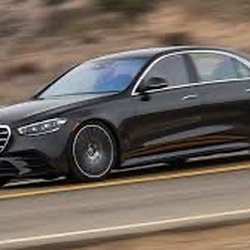 Sky Ride Taxi Cab and Airport Shuttle - Santa Fe Sky Ride Car and Concierge, featuring a luxurious black Mercedes S-580