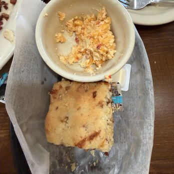 Twisted Biscuit Diner - This was a bacon cheddar biscuit with some pimento cheese after we had already started eating. It came with three biscuits. - American Near Me - Tavares, Florida Twisted Biscuit Diner - This was a bacon cheddar biscuit with some pimento cheese after we had already started eating. It came with three biscuits. - American Near Me - Tavares, Florida