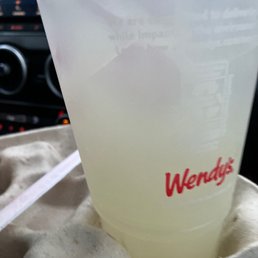 a drink in a plastic cup a drink in a plastic cup