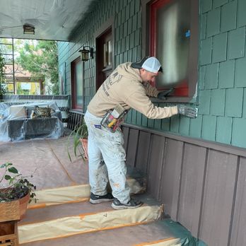HR painting and design - Painter detailing exterior window with careful prep and smooth finish, ensuring clean lines, proper sealing, and a durable, professional res - Painters Near Me HR painting and design - Painter detailing exterior window with careful prep and smooth finish, ensuring clean lines, proper sealing, and a durable, professional res - Painters Near Me