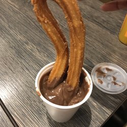 Xurreria - Hot churro dipped in melted chocolate