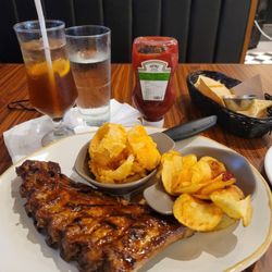 T.G.I Fridays - Sweet, sweet lemon iced tea. Ribs, chips, onion rings.