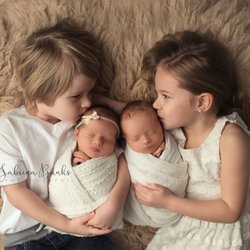 Sabrina Banks Photography - one week old twins with siblings in Omaha, NE