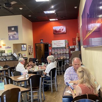 Neuhaus Cafe - people sitting at tables eating - Cafes Near Me - Dallas, Texas Neuhaus Cafe - people sitting at tables eating - Cafes Near Me - Dallas, Texas