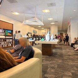 Spectrum - +40 customers waiting in line. No employees helping anyone