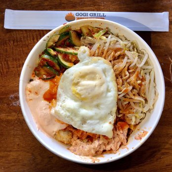 All About Gogi - Beef (Galbi-shortrib) ($12)over kimchi fried rice w/ a fried egg (1$)  on top w/ kimchi cucumber, spicy slaw, watercress and siracha cream - Korean Near Me - Hoboken, New Jersey