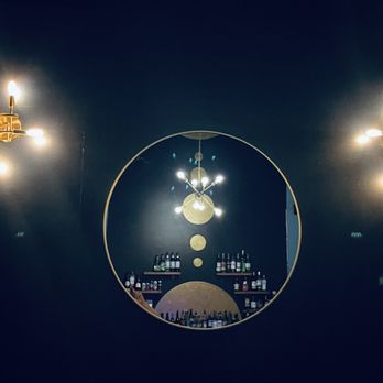 Ramble Tamble - a circular mirror in a bar - Cocktail Bars Near Me - Bellingham, Washington Ramble Tamble - a circular mirror in a bar - Cocktail Bars Near Me - Bellingham, Washington